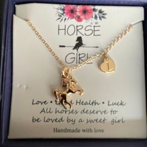 Girl’s Initial “L” horse necklace. NIB. $10